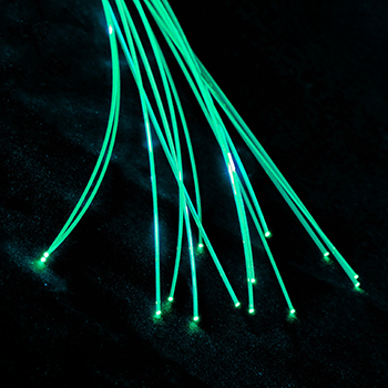 Green emitting fibers